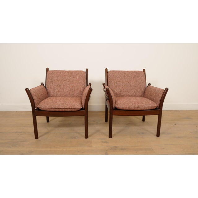 Set of 2 beautifully designed armchairs designed by Illum Wikkelsø and produced by C.F.C. Silkeborg in the 1960s. The...