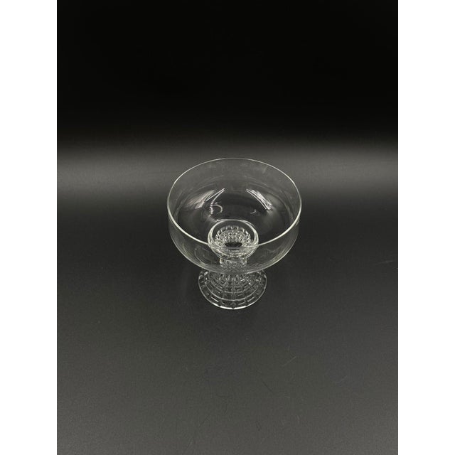 A champagne flute, likely from the renowned Rosenthal brand, from the Polaris series, crafted from high-quality crystal...