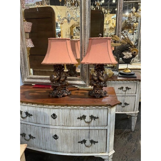 Nice pair of 19th century German Black Forest carved rooster groupings as lamps. Circa 1870. Adds warmth and charm to any...