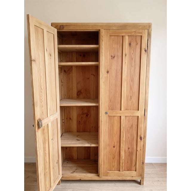 Vintage Parisian Wardrobe in Fir, 1945s, in Very Good conditions. Designed 1920 to 1949 This piece has an attribution...