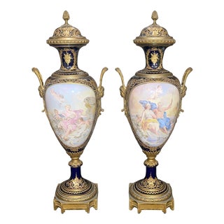 Pair of 19th Century French Sèvres Porcelain Urns With Ormolu Mounts For Sale