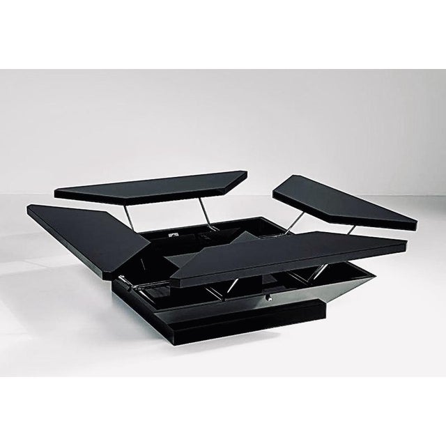 the closed table has the following dimensions; 37x152x152 Open 59x200x200 I have official proof of authenticity such as...