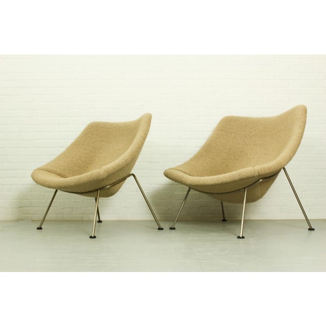 Gentleman and Lady Model Oyster lounge chairs by Pierre Paulin for Artifort, Netherlands, Shells covered with foam and...