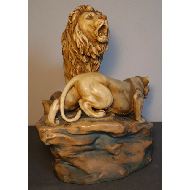 Up for sale is a Circa 1900 Austrian Art Nouveau Theodore Schoop for Bernard Bloch Porcelain Lion and Lioness on Rock...
