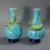 Pair of Royal Worcester Majolica vases which feature a Chinese dragon wrapped around the sides. Colouration: turquoise,...