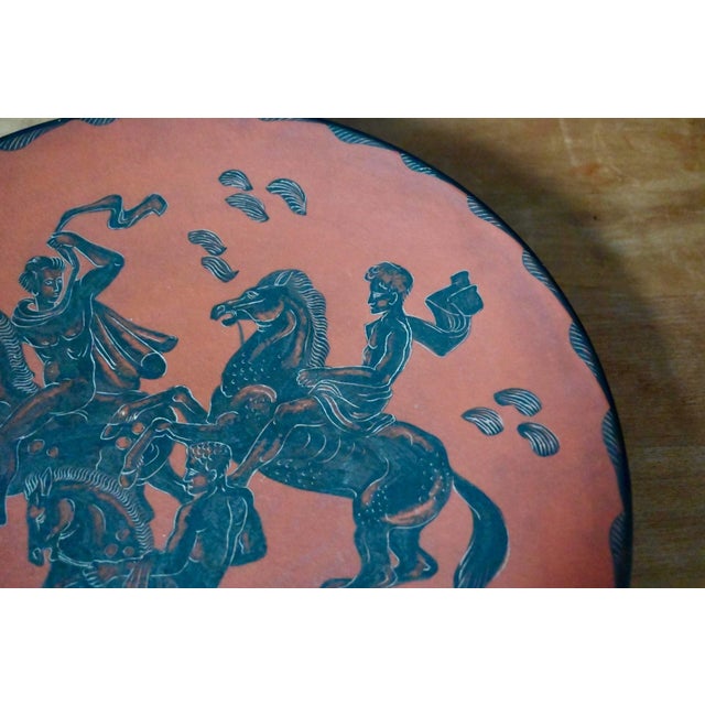 Striking in its size and the delicacy of its design, this large platter dates from the 1940s and was made by Fernand...