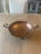 Antique copper and brass dish bowl footed, with 3 legs. Primitive style. Patina all over the bowl. Very nice decorative bowl.
