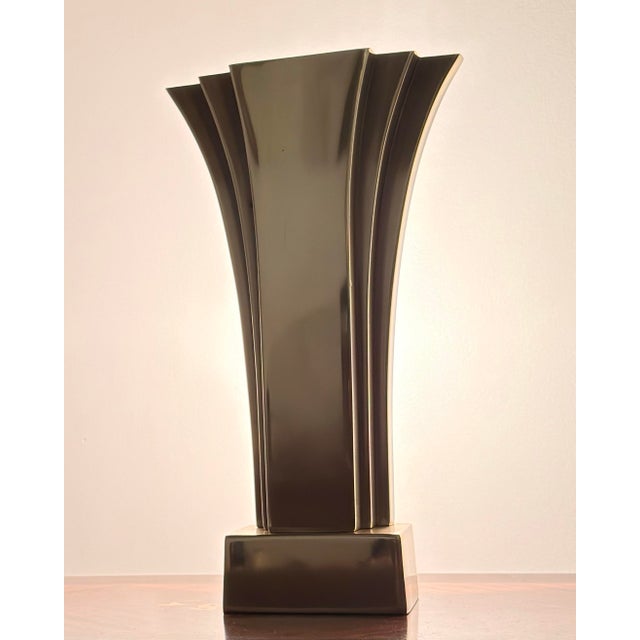 A striking vintage table lamp by Stiffel, featuring a dramatic fan-shaped silhouette that blends Art Deco Revival geometry...