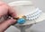Vintage Signed Hattie Carnegie 3-Strand White Beaded Faux-Turquoise Necklace For Sale In Philadelphia - Image 6 of 8
