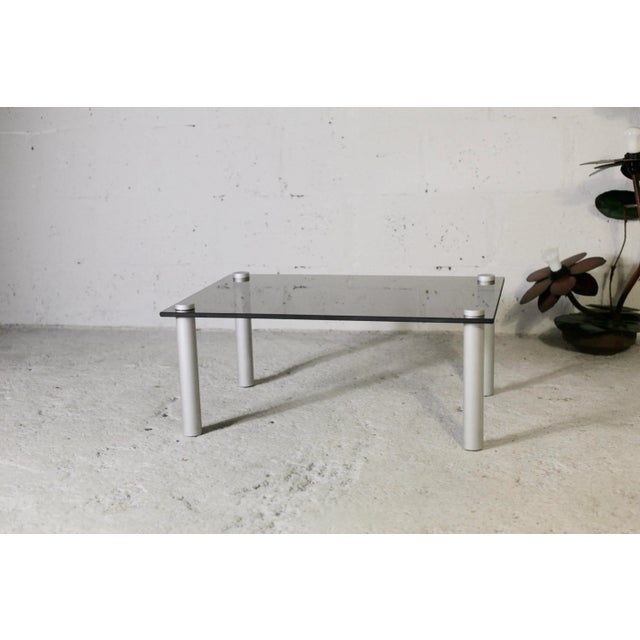 Cylindrical coffee table legs, smoked glass top, circa 1970. Attributed to Marco Zanuso, similar models edited by Zanotta....