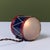 Petite drum lamp by Lurelle Guild for Chase, c.1930s, USA. The Art Deco lamp features an enameled navy and red metal body...