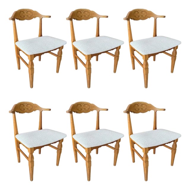 Danish Carved Oak Dining Chairs by Henning Kjærnulf, Attributed For Sale