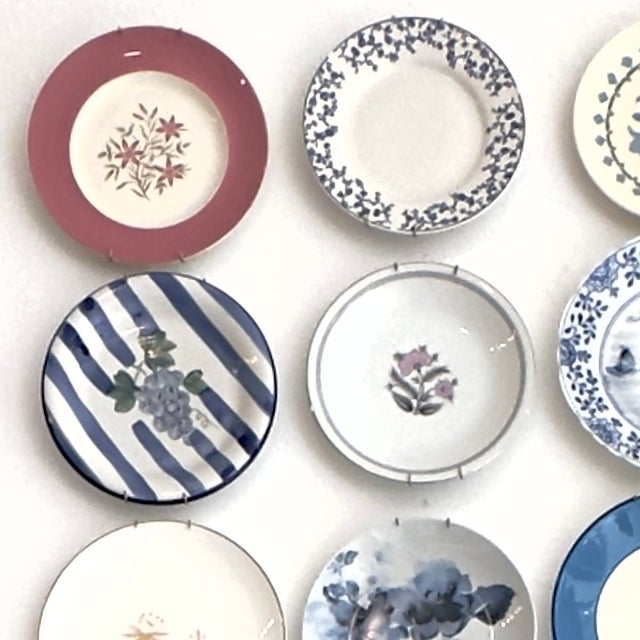 Mixed blue and pink decorative plates, group of 18. This eclectic set of decorative side plates is the perfect statement...