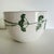 Vintage enamel covered steel bowl produced by Finel Arabia and designed by Kaj Franck. Green chervil herbs on white...