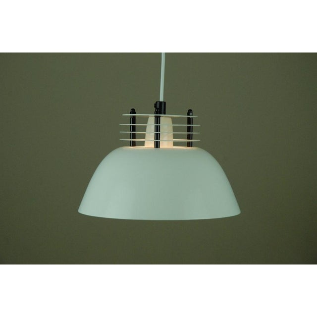 This pendant lamp was designed by Jurgen Buchwald for Laterna Danica range produced by Nordlux, Denmark in the 1970s. The...