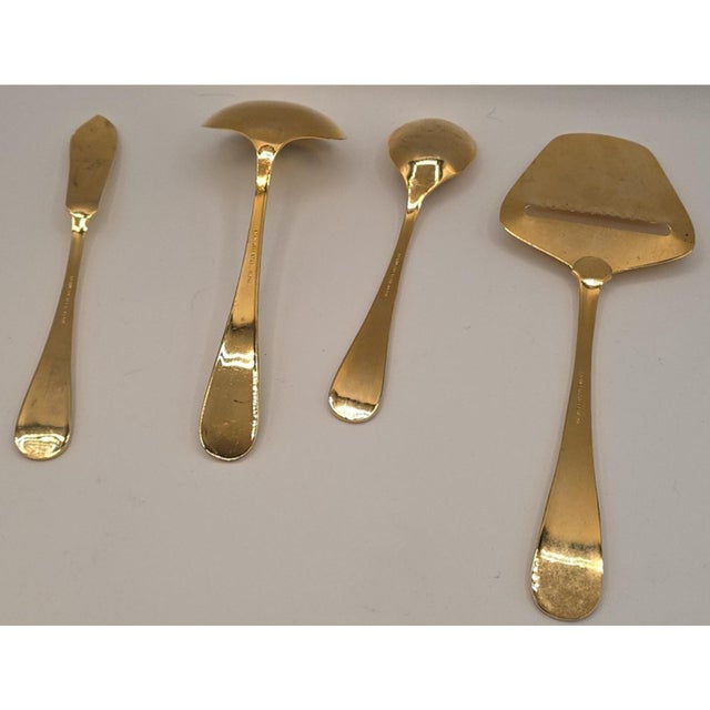 JCPenney Hollyberry 4 Piece Serving Set in gold tone with festive red and green holly leaf enamel decoration on handles,...