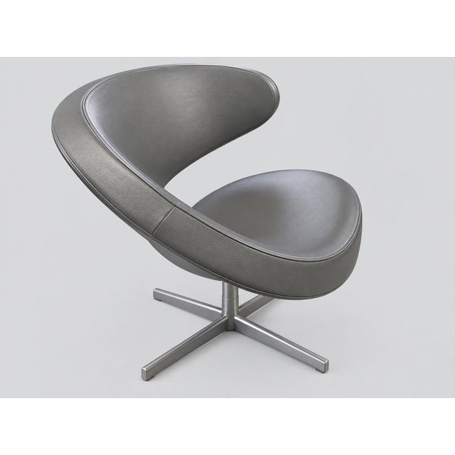 Offered is an original VARIER Peel Club lounge chair from around 2008, upholstered in light gray faux leather. The VARIER...
