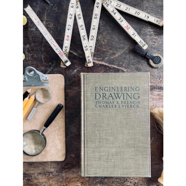 Learn about engineering drawing with this mid-century textbook. Perfect for enthusiasts and draftsmen, it provides...