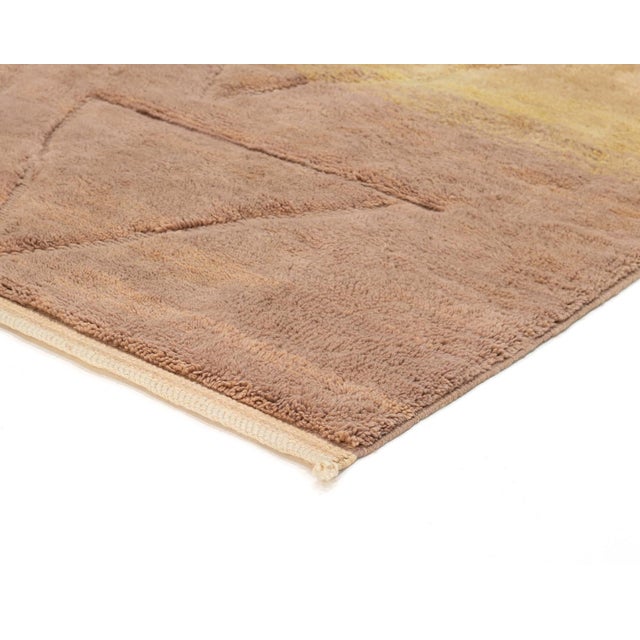 Exquisite hand-knotted natural wool rug in muted Misty Taupe with Ochre and Goldenrod Yellow geometric accents, offering a...