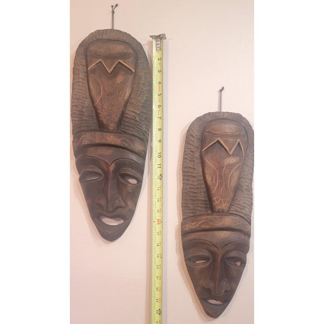 African Pair of Hand Carved Wooden Tribal Face Mask Folk Art For Sale - Image 3 of 16