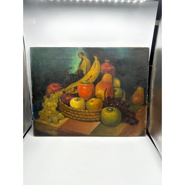 A richly colored still life by California artist Elsie Palmer Payne (1884–1971). Apples, pomegranates, pears, bananas, and...