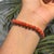 Add a bold touch of color to your jewelry collection with this elegant Carat&Her tennis bracelet, featuring 25.7 carats of...