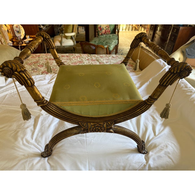Elegant and Graceful pair of French Regency Hand Carved and Gilt Benches in original Finish and fabric.