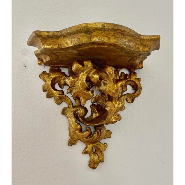 Wall wood gold console with foliage motifs in gilded wood France Decorative and delicate The leaves are very precise and cut.