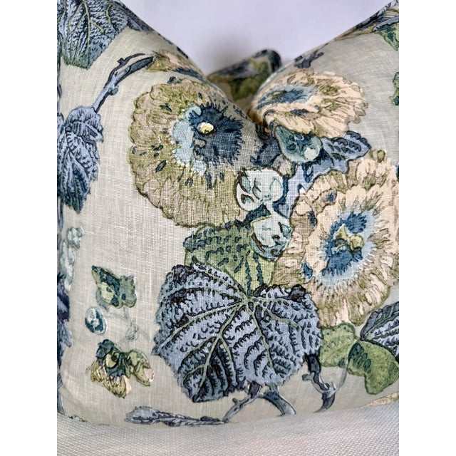 Custom pair of 20" pillows covered in Cowtan & Tout "Hollyhocks" hand blocked print in color indigo/aqua. These pillows...