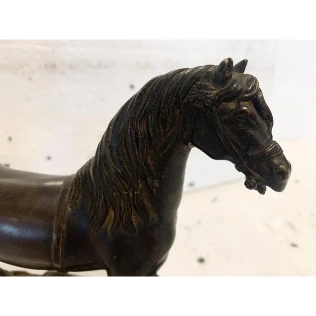 "The Rearing Horse on its Pedestal" Bronze group with brown patina Good condition Dimensions: H 18 x W 21 x 8 cm 20th century