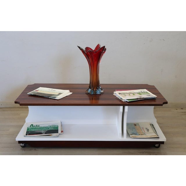 This is a stunning and sophisticated piece of mid-century furniture. Italian design from the 1970s often combines elegance...