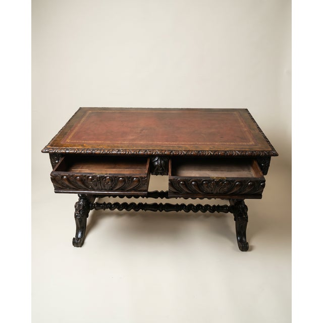 Bring timeless English craftsmanship into your home with this antique Jacobean Revival library table by Hobbs & Co. of...