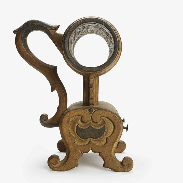 A 19th-century Tuscan fraternity ballot box, crafted from turned and carved catwood. The central body is barrel-shaped,...