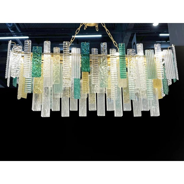 Scenographic italian hand-made chandelier with multicolors strip “listelli”, elements of murano glass. huge rectangular...