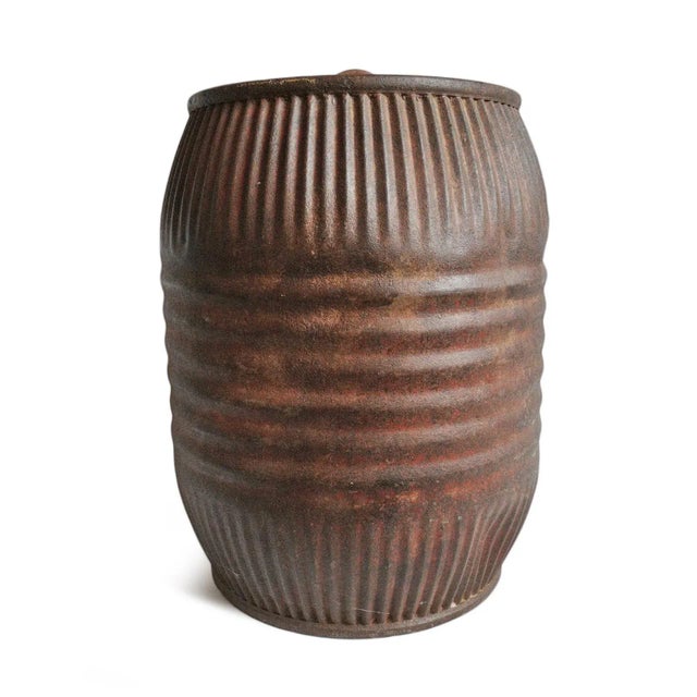 Vintage iron grain barrel from India. Solid iron with ribbed form and original painted worn finish with beautiful...