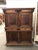French Louis XIII buffet a deux corps in walnut with two doors atop two drawers and two bottom doors. Carved barley twist...