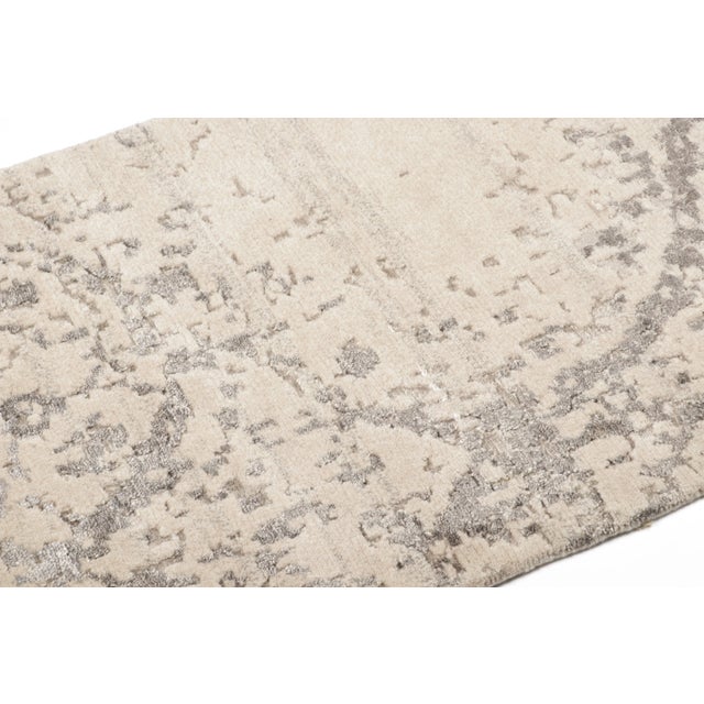 This 2x3 contemporary geometric gift-sized rug brings a refined textural quality to the floor. Hand-knotted in wool, it...