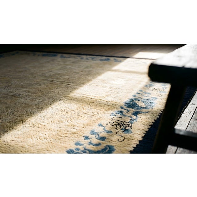 Enchanting Beige Background Color and Black Border With Tone-on-Tone Pattern Antique Chinese Peking Rug For Sale - Image 14 of 15