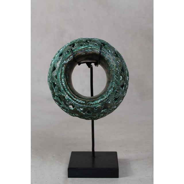 Discover the Benin Bronze Bangle Elevate your space with the Benin Bronze Bangle , a captivating piece of African art that...