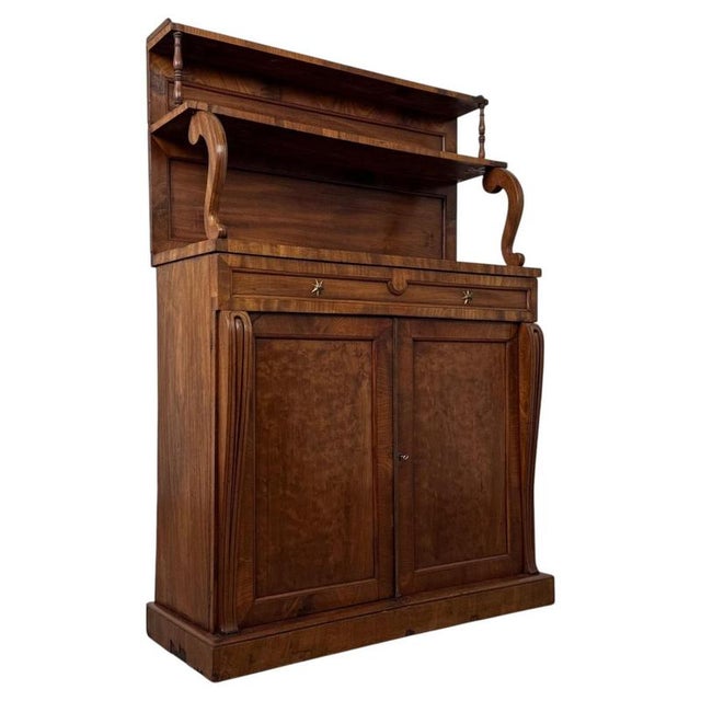 An exceptional early 19th-century English Regency chiffonier, finely constructed in mahogany and distinguished by its...