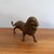 Solid brass lion figurine, with a thick mane and roaring jaw. Circa 1980s with a rich patina. Please see condition details...