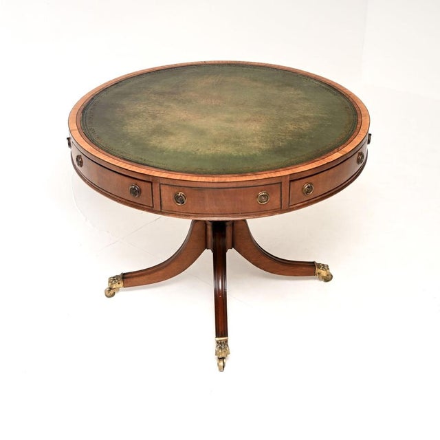 A lovely antique Regency style leather top drum table, dating from around the 1890-1910 period. The quality is superb,...