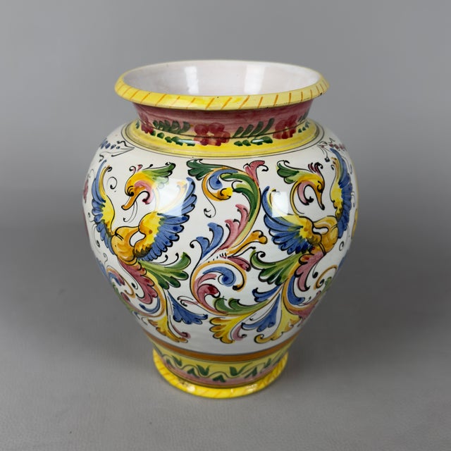 A stunning ceramic vase, an expression of the finest tradition of the Deruta masters. This exquisite vase from the 1960s...