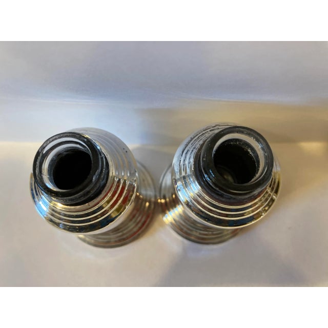 These lovely salt and pepper shakers were a wedding gift in 1965. I love to set a beautiful table and these have often...