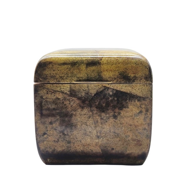 A cube-shaped box, of manufactured in Italy in the 1950s or 1960s. The piece is entirely clad using distinctive technique:...