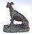 This wonderfully expressive seated greyhound with head turned and paw raised