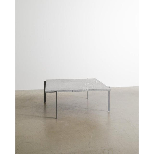 A rare danish mid century low coffee table model "pk61" with an iconic and decorative squared cipollini marble top and an...