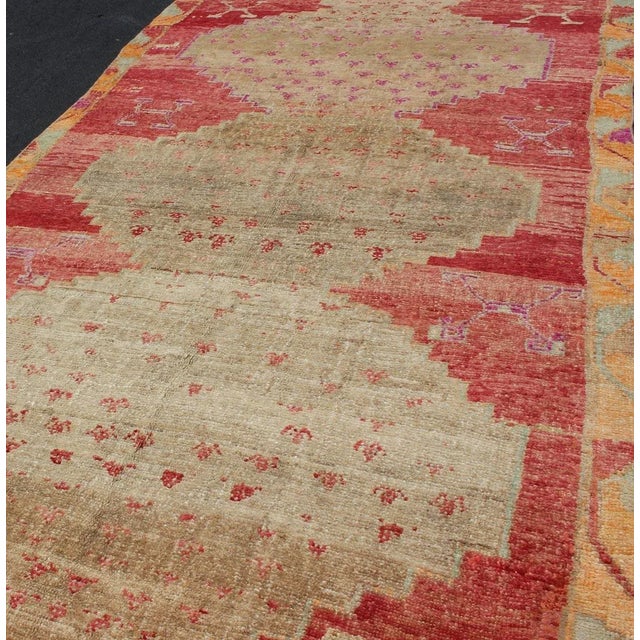 Mid 20th Century Vibrant Hand Knotted Turkish Vintage Runner in Faded Red, Coral, Orange, Pink and Green For Sale - Image 5 of 13