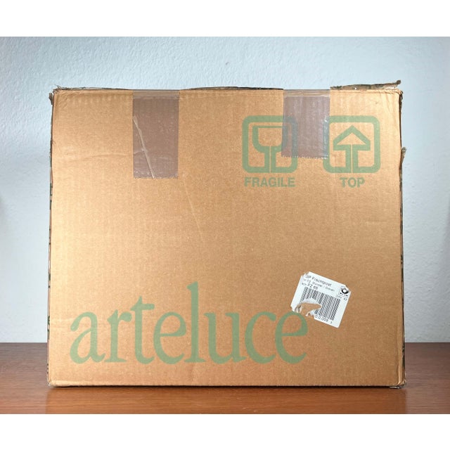 Murana wall lamp by the renowned manufacturer arteluce, designed by perry a. King and s. Miranda in the 1980s. Rare icons...