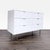 This Pottery Barn dresser features a clean white finish, modern geometric detailing, and six spacious drawers for plenty...
